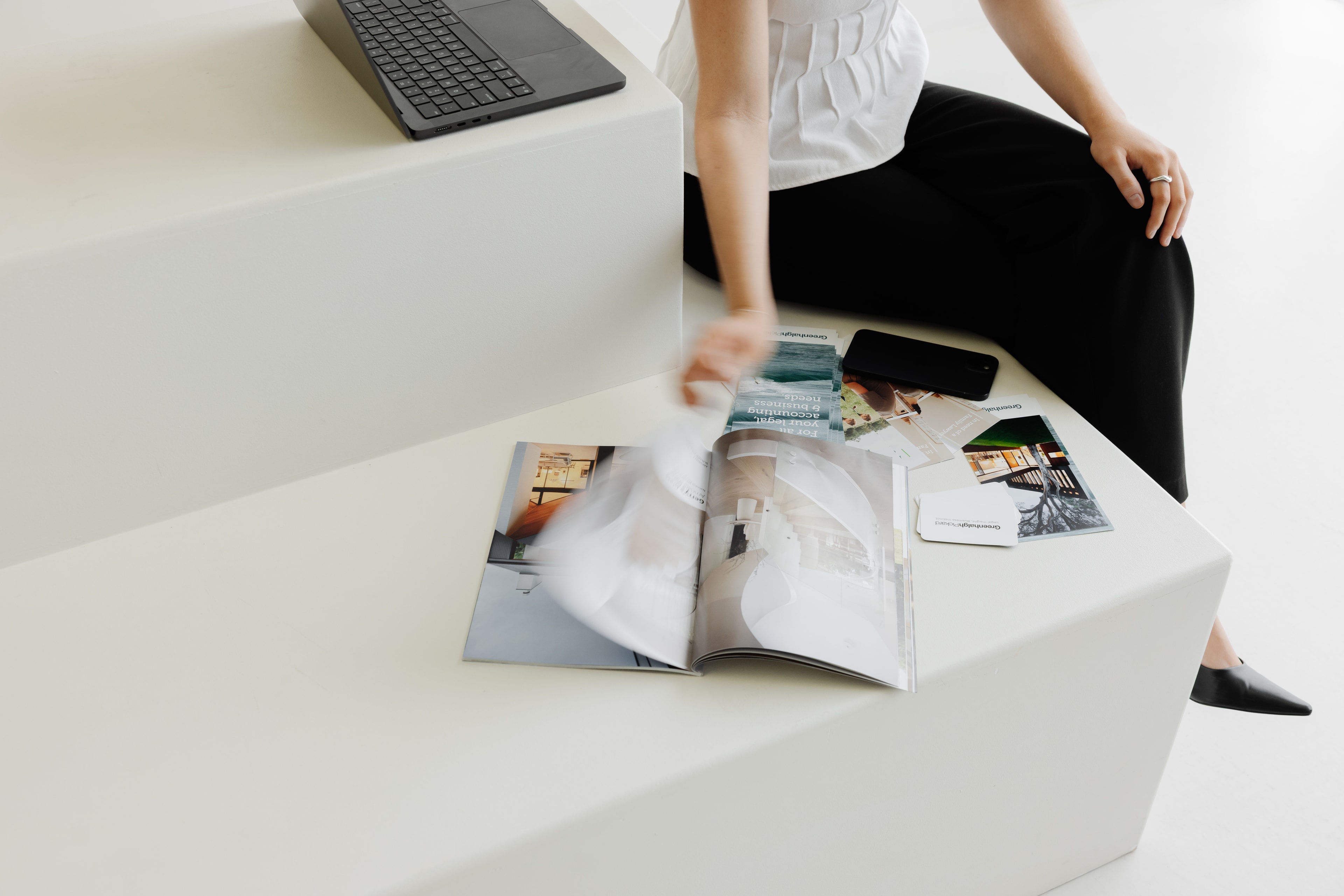 Brink team member taking a look at a magazine